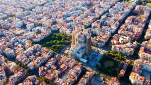Aerial view of cityscape of Barcelona, Eixample district and Sagrada Familia